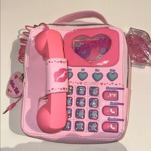 READ Sugar Thrillz LOVE LINE CROSSBODY BAG